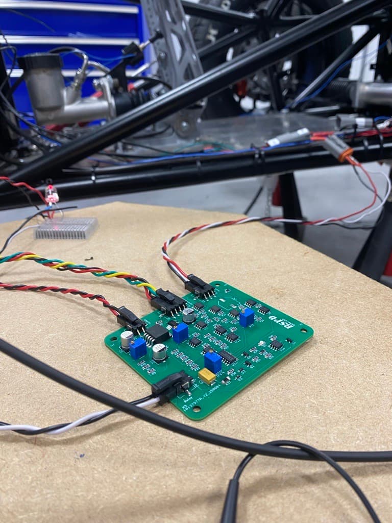 BSPD connected beside the Formula Student vehicle during integration testing