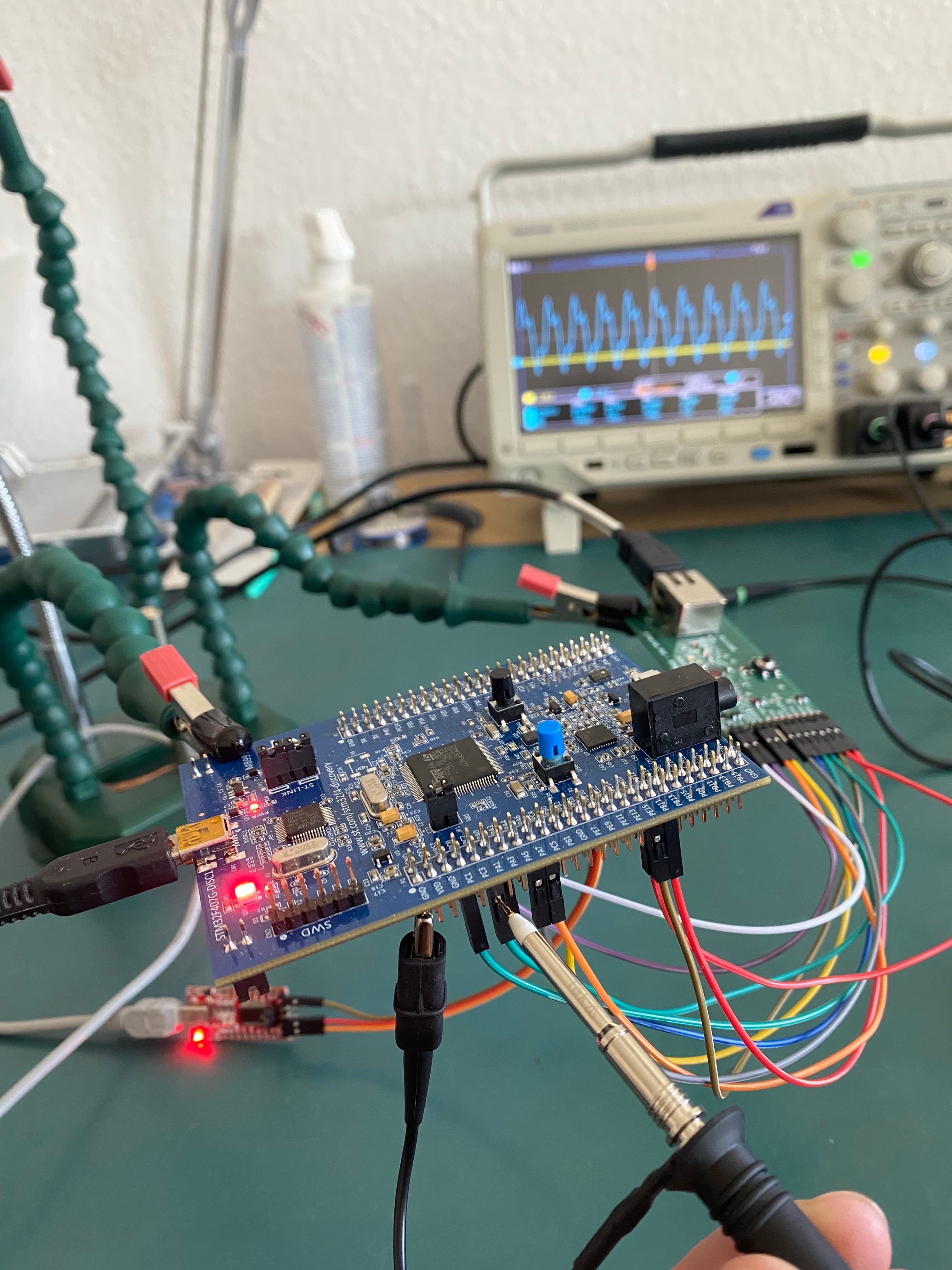 STM32F407G-DISC1-based prototype under oscilloscope measurement